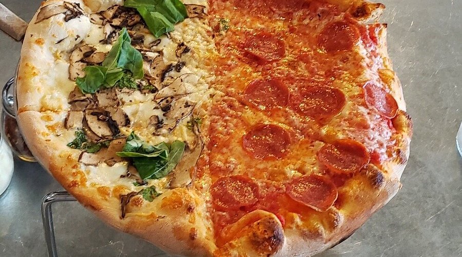 Supino Pizzeria signature dishes Shonda's Cheese bread, Supino Pizza, Jess Pizza.